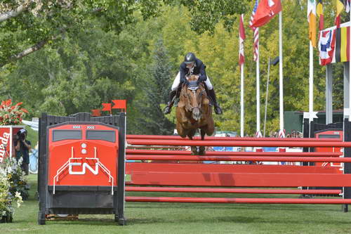 Spruce-Meadows-9-8-13-3580-PieterDevos-Candy-BEL-DDeRosaPhoto