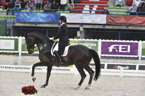 WEG-Dressage-8-25-14-GPTeam-0006059-AdrienneLyle-Wizard-USA-DDeRosaPhoto