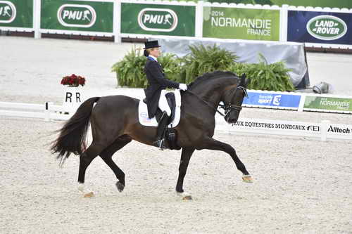 WEG-Dressage-8-25-14-GPTeam-0003882-TinaKonyot-CalectoV-USA-DDeRosaPhoto