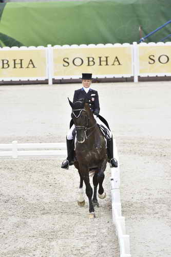 WEG-Dressage-8-25-14-GPTeam-0003890-TinaKonyot-CalectoV-USA-DDeRosaPhoto