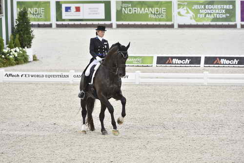 WEG-Dressage-8-25-14-GPTeam-0003971-TinaKonyot-CalectoV-USA-DDeRosaPhoto