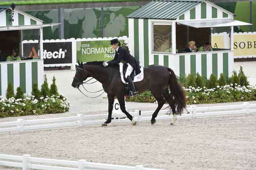 WEG-Dressage-8-25-14-GPTeam-0004002-TinaKonyot-CalectoV-USA-DDeRosaPhoto